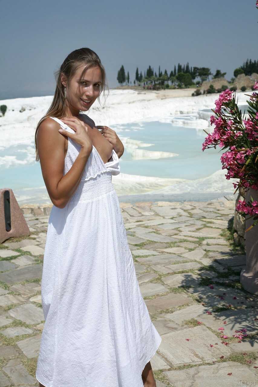 Sexy Brunette Alizeya A Exposes Her Uncovered Pussy on the Beach While Posing for Upskirt Pictures - Alizeya A