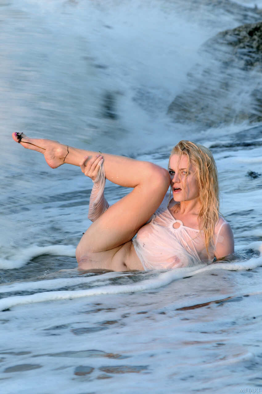 Beach Babe Angela C Rides the Waves with Her Sexy Pussy