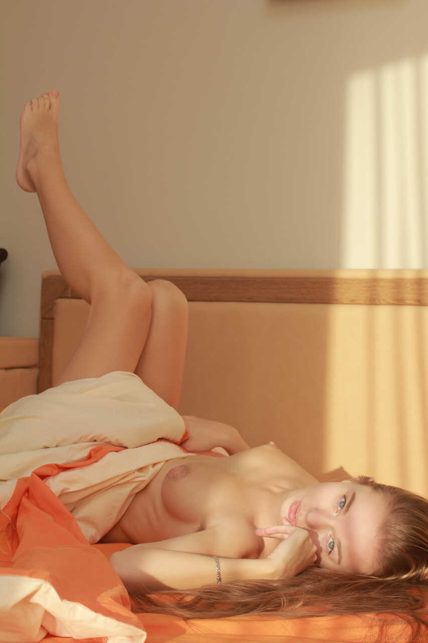 Beautiful angelic babe Milena D flaunts her hairy pussy and sexy feet while showing off her perfect teen body. - Milena D
