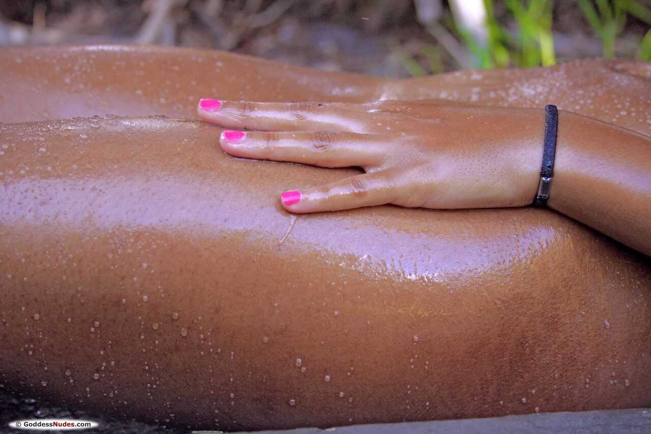 Ebony Goddess Tierra Shows Off Her Juicy Booty and Busty Chest in an Outdoor Shower - Tierra