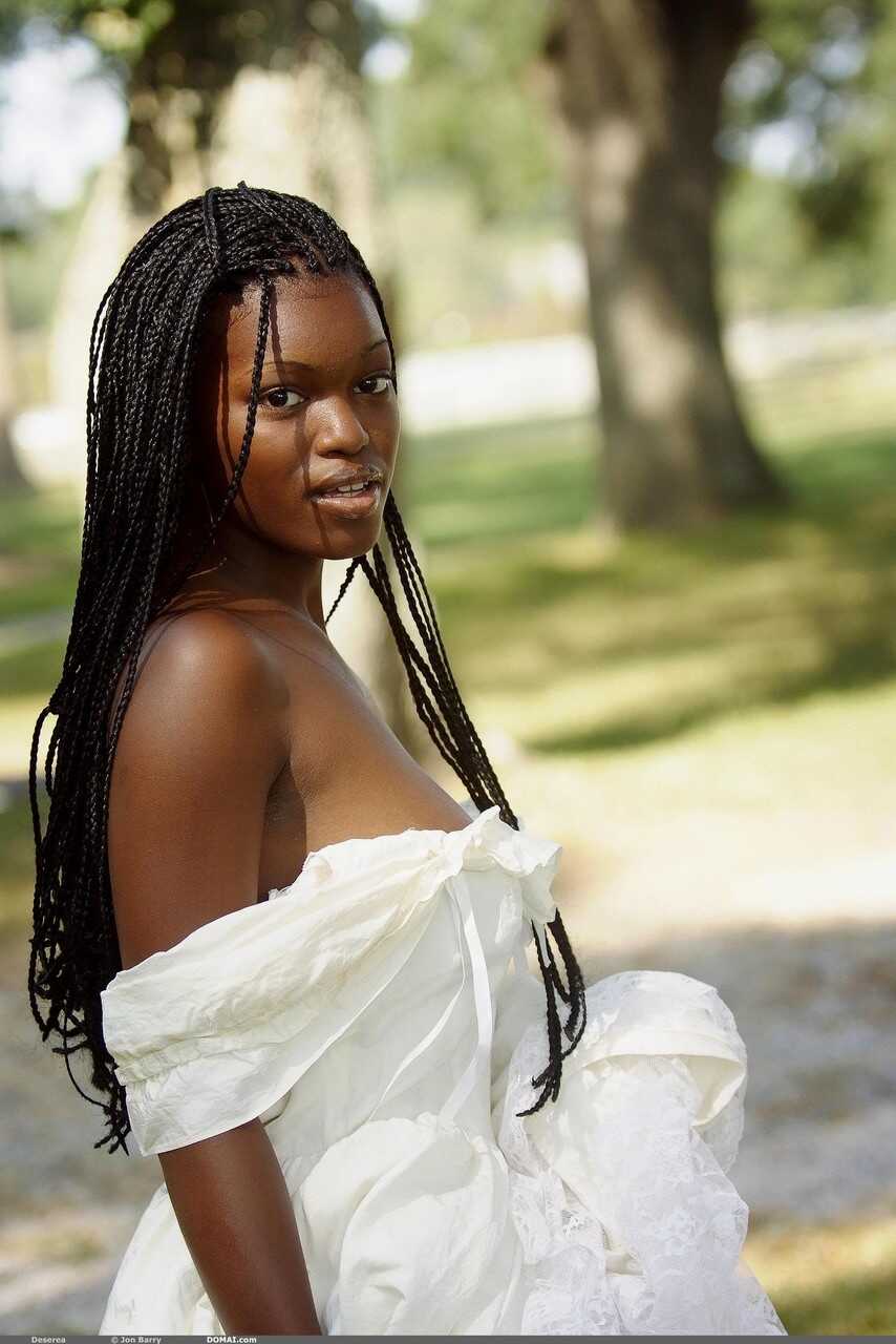 Ebony with amazing big tits Deserea doffs her dress and poses outdoors - Deserea