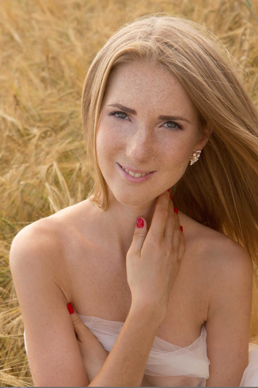 Skinny redhead teen Lera F gets fully nude and flaunts her round tits outdoors for the camera. - Lera F