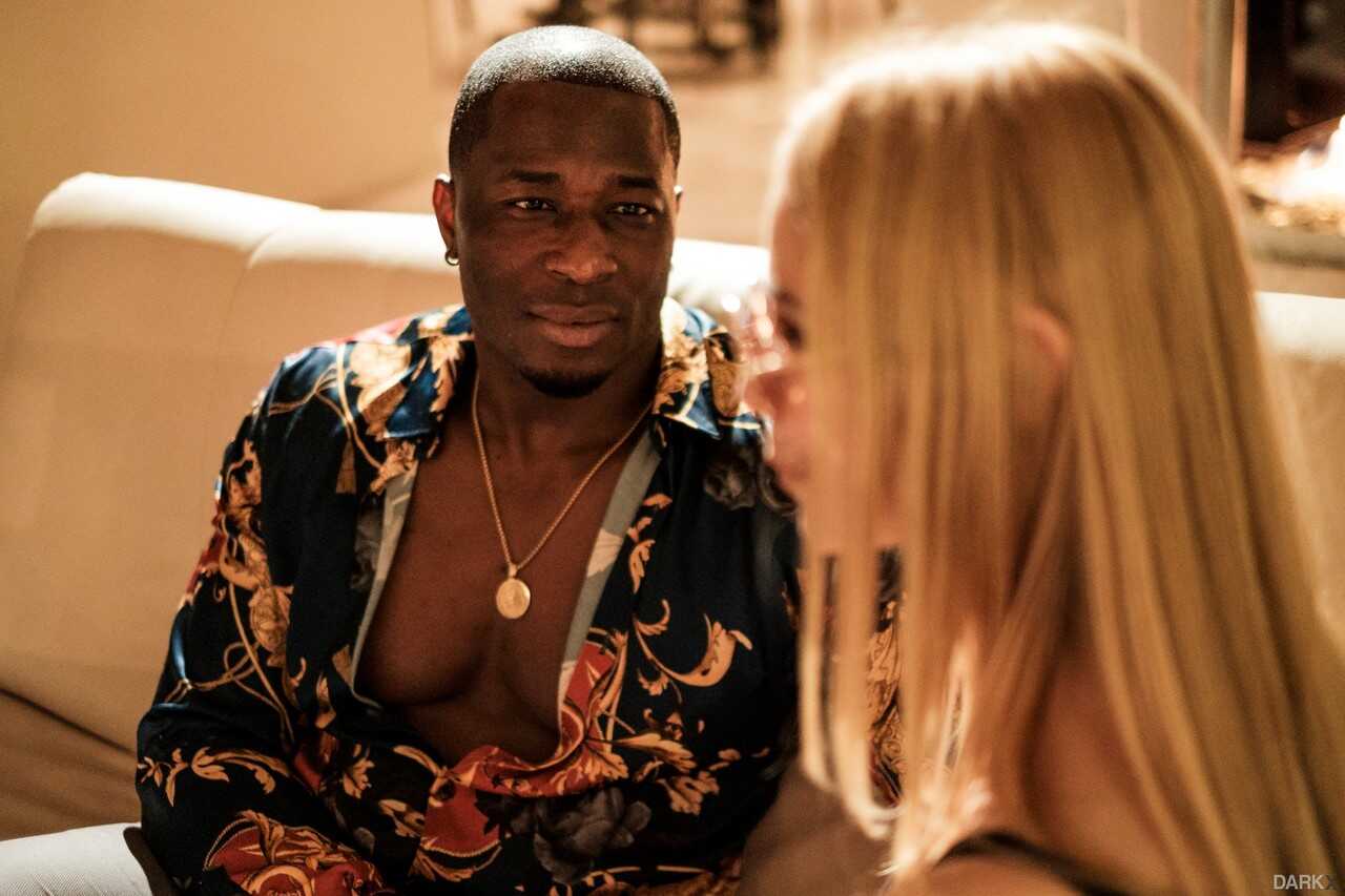 Blonde MILF with big boobs Sarah Vandella gets pounded by a black meat pole while wearing a tight dress in this interracia...
