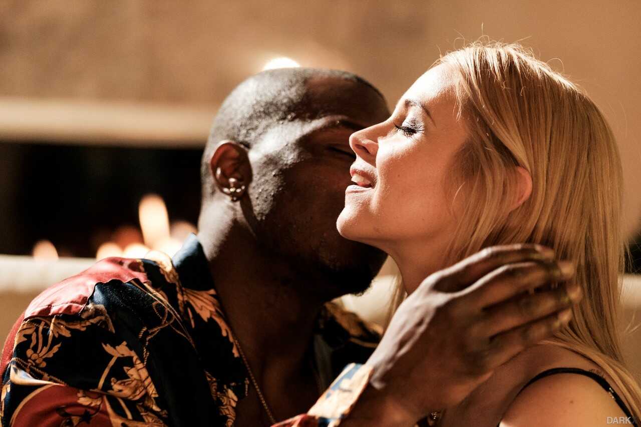 Blonde MILF with big boobs Sarah Vandella gets pounded by a black meat pole while wearing a tight dress in this interracia...