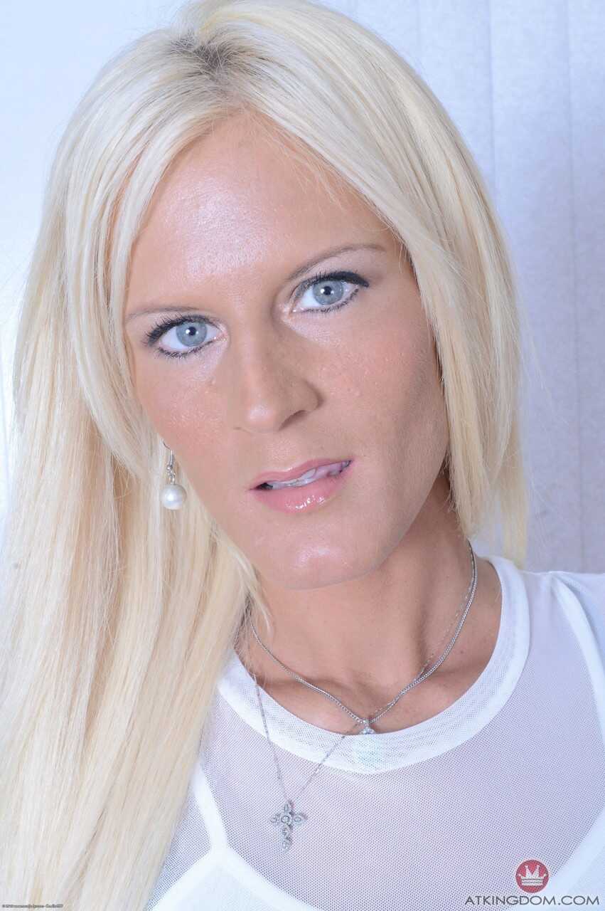 Stunning mature Olivia Blu flaunts her big natural tits and open pussy bent over. - Olivia Blu