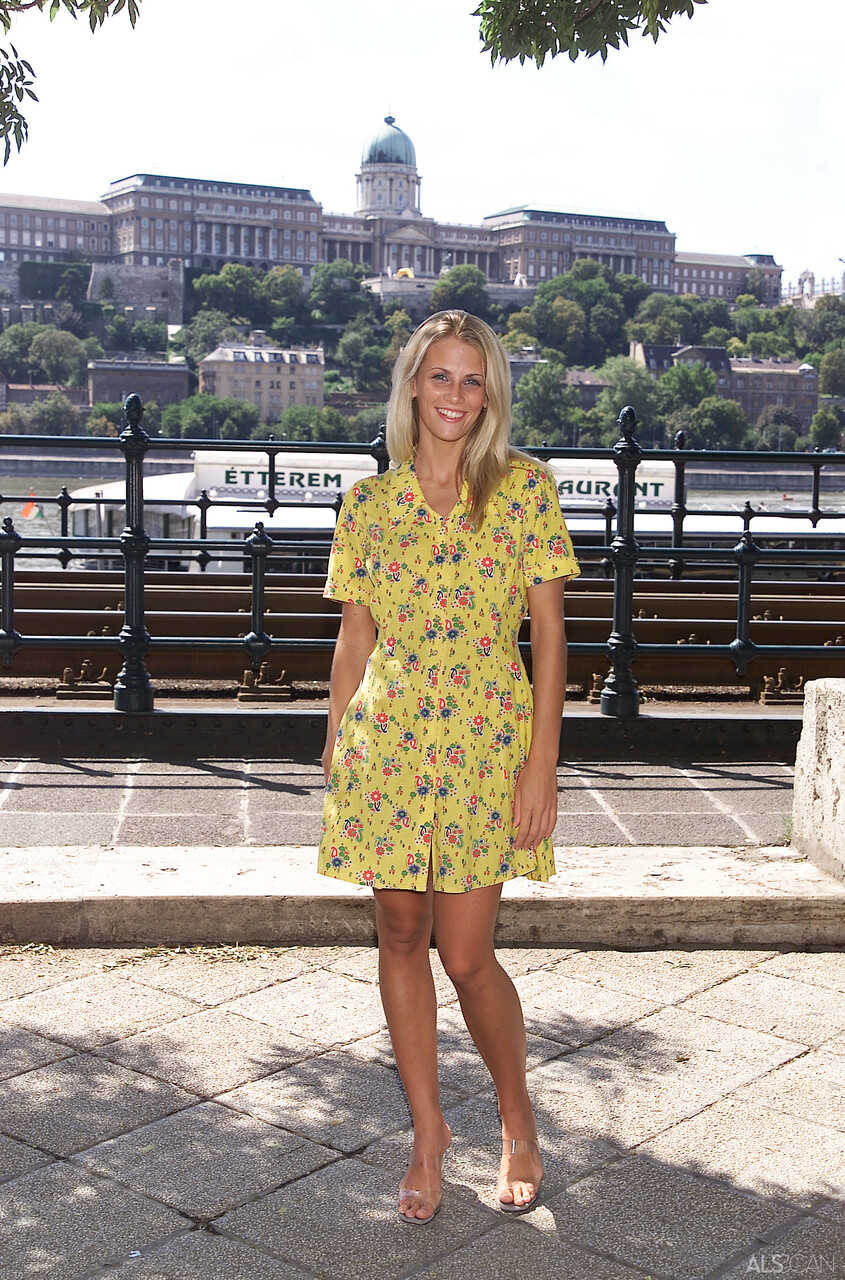 Blonde teen Krisztina gets turned on and removes her yellow dress in public, flaunting her body for all to see! - Krisztina