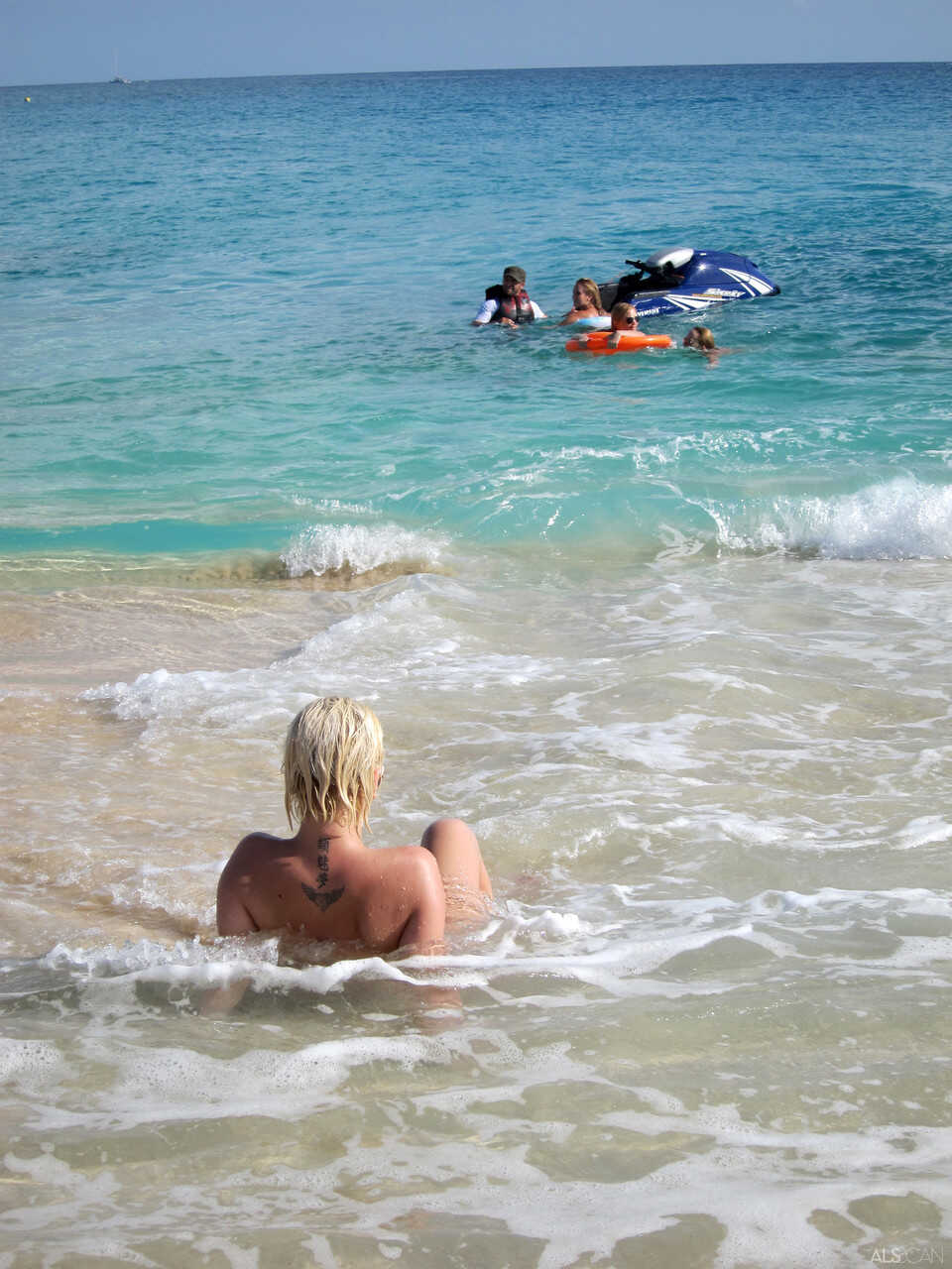 Blonde lesbian Bibi Noel and her slutty GFs frolic on the beach while naked, exposing their tight shaved pussies for all to see.