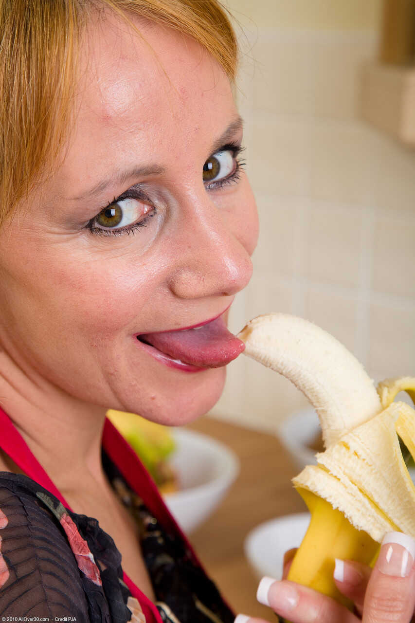 Kinky mature Tiffany T exposes her saggy tits and rubs her twat in the kitchen with her sexy panties on - Tiffany T