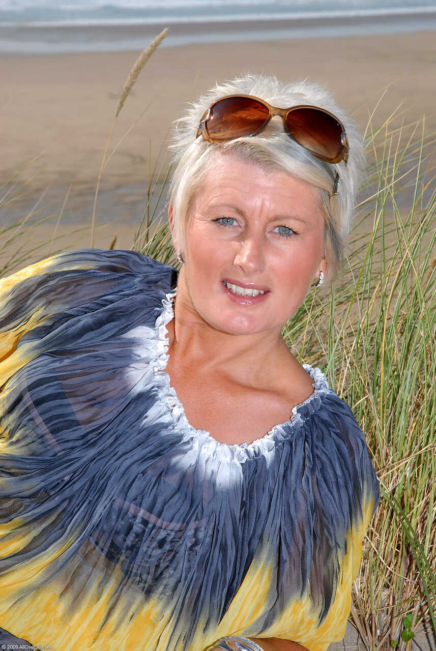 Sally T Short Haired Blonde Mature Exposes Her Pierced Pussy on the Beach - Sally T