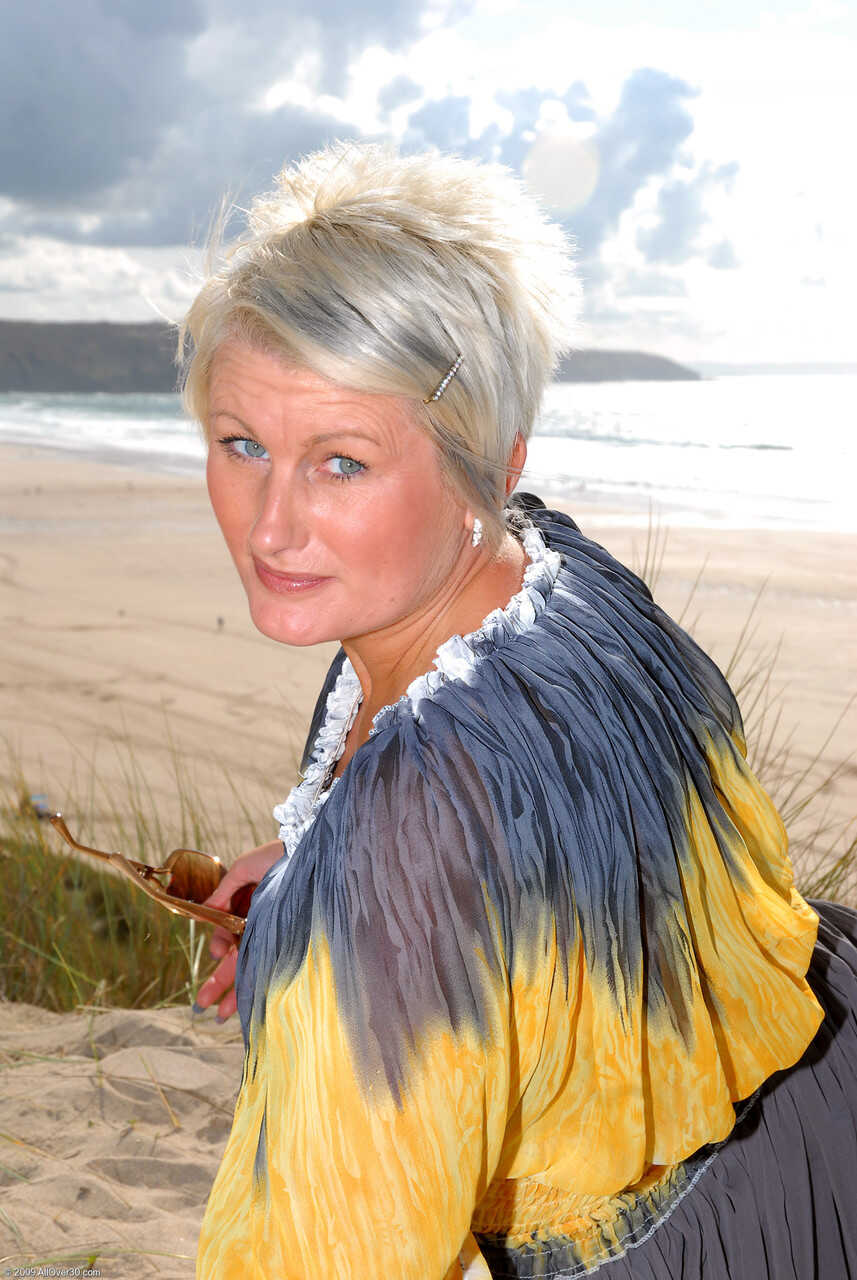 Sally T Short Haired Blonde Mature Exposes Her Pierced Pussy on the Beach - Sally T