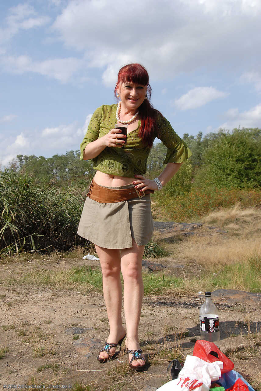 Ginger Esmeralda Takes A Pee Outdoors And Poses Pantyless - Esmeralda