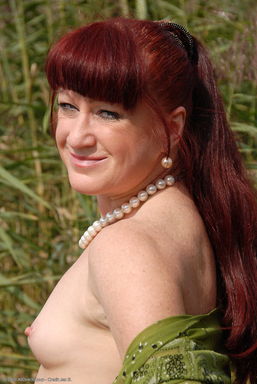 Ginger Esmeralda Takes A Pee Outdoors And Poses Pantyless - Esmeralda