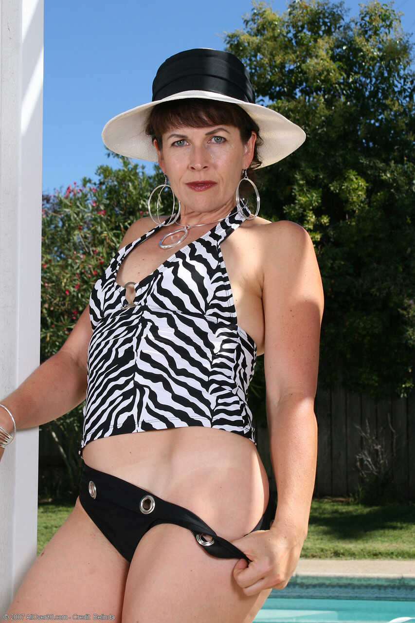 Andie's Kinky Nude Poolside Antics - Andie