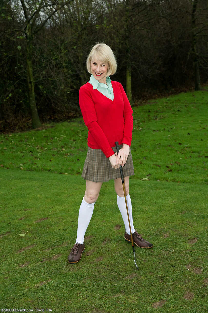 Mature Blonde Hazel Shows off Her Big Booty and Hairy Pussy After Golfing: A Hot MILF Invites You to Take a Peek at Her Na...