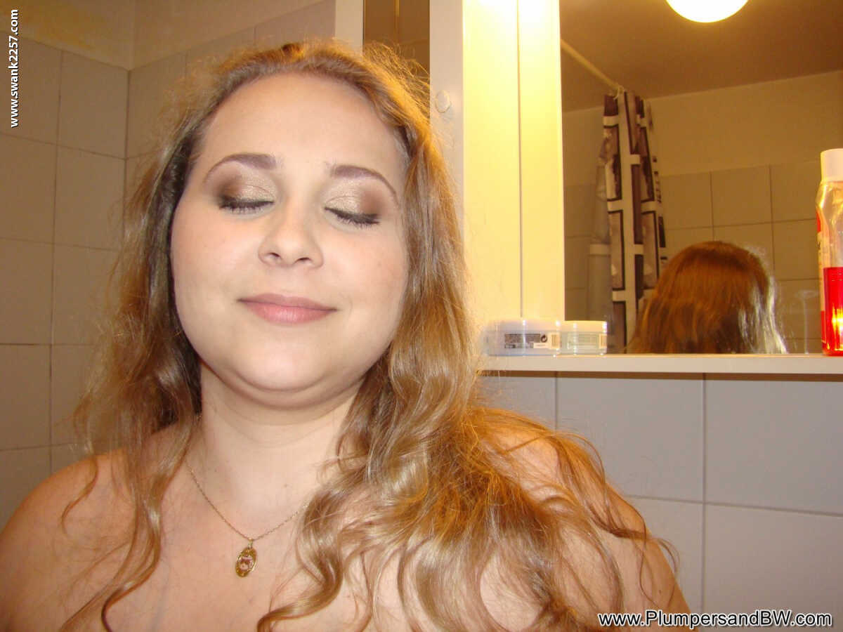 Chubby amateur Edita takes a huge shit on the toilet while exposing her fat ass and huge saggy tits - Edita