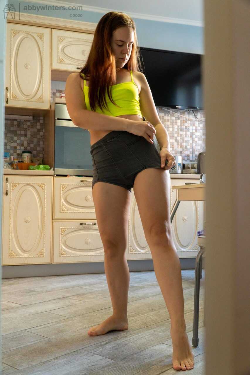 Busty Milf Anca wearing sexy lingerie, teasing her tight panties while cooking 