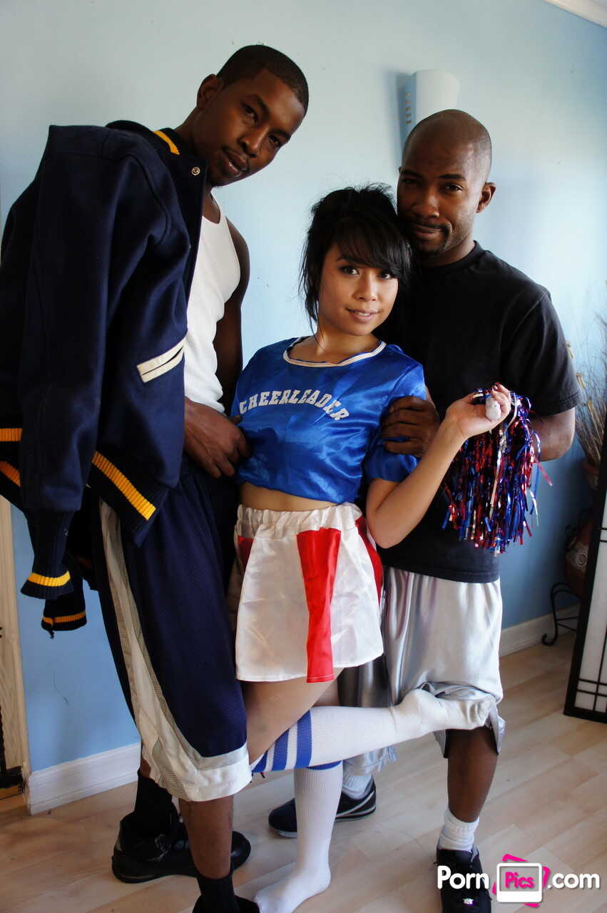 May Lee's Sexy Asian Cameltoe Gets Stretched by Two Massive Black Dicks in this Interracial Cheerleader Porn - Isiah ...