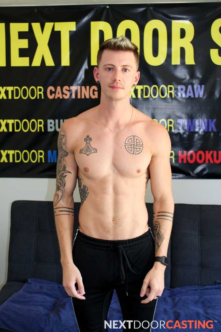 Tattooed hunk Dante Foxx jerks off on the sofa while playing with his massive cock - 