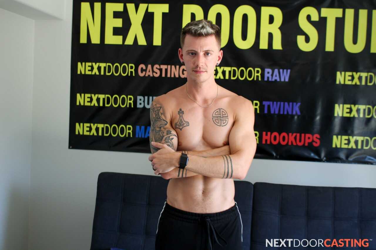 Tattooed hunk Dante Foxx jerks off on the sofa while playing with his massive cock - 