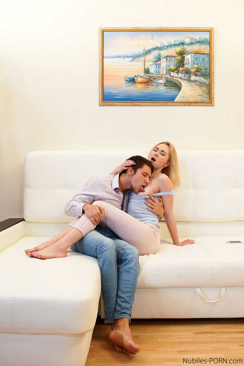 Russian teen Via Lasciva slides a dick in her mouth before a ride on a couch - Via Lasciva
