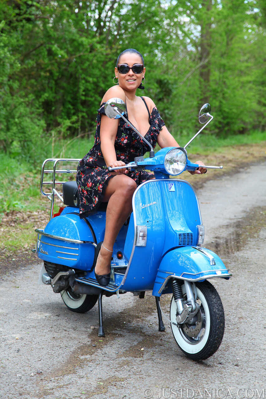 Curvy MILF Danica Collins shows her giant tits on a motorcycle in the woods! - Danica Collins