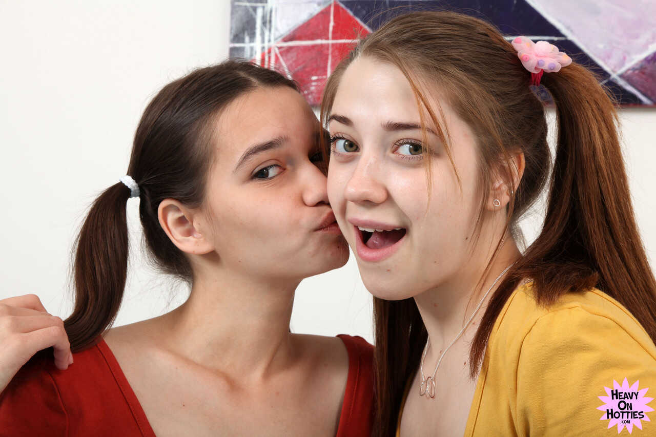 Sweet slender teen Pinky Breeze and her girlfriend play with a sex toy, spreading their tiny tits for the camera - Pinky B...
