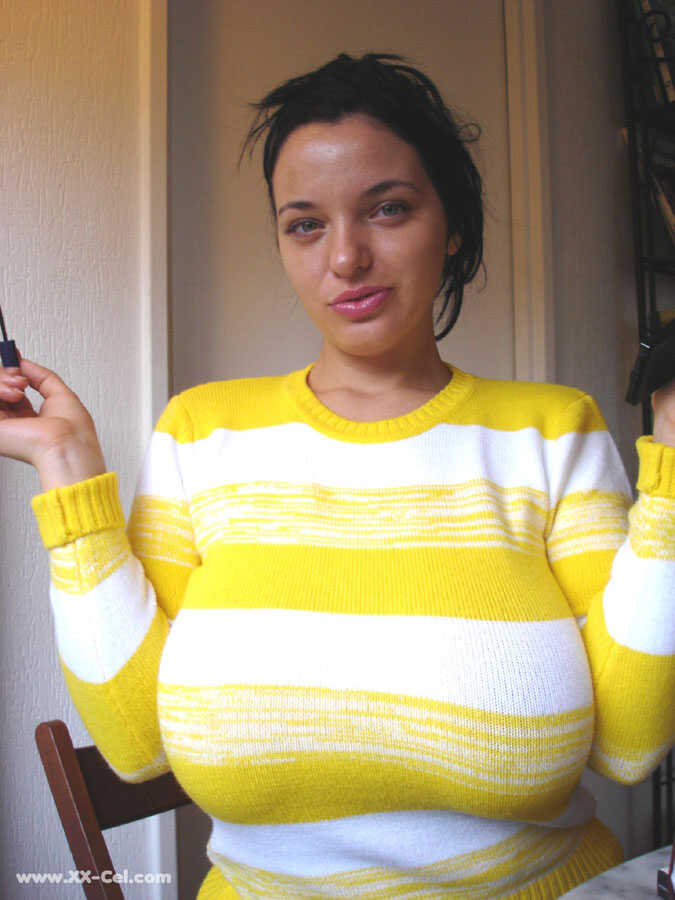 Amateur beauty Joana puts sexy lipstick on before revealing her natural big tits with chubby solo action - Joana