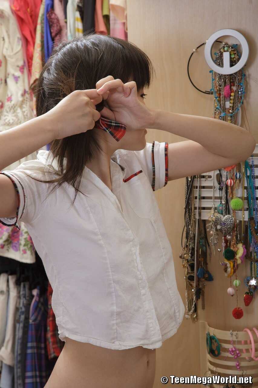 Little Asian teen Ksu puts her schoolgirl outfit on and masturbates in the shower after school - Ksu