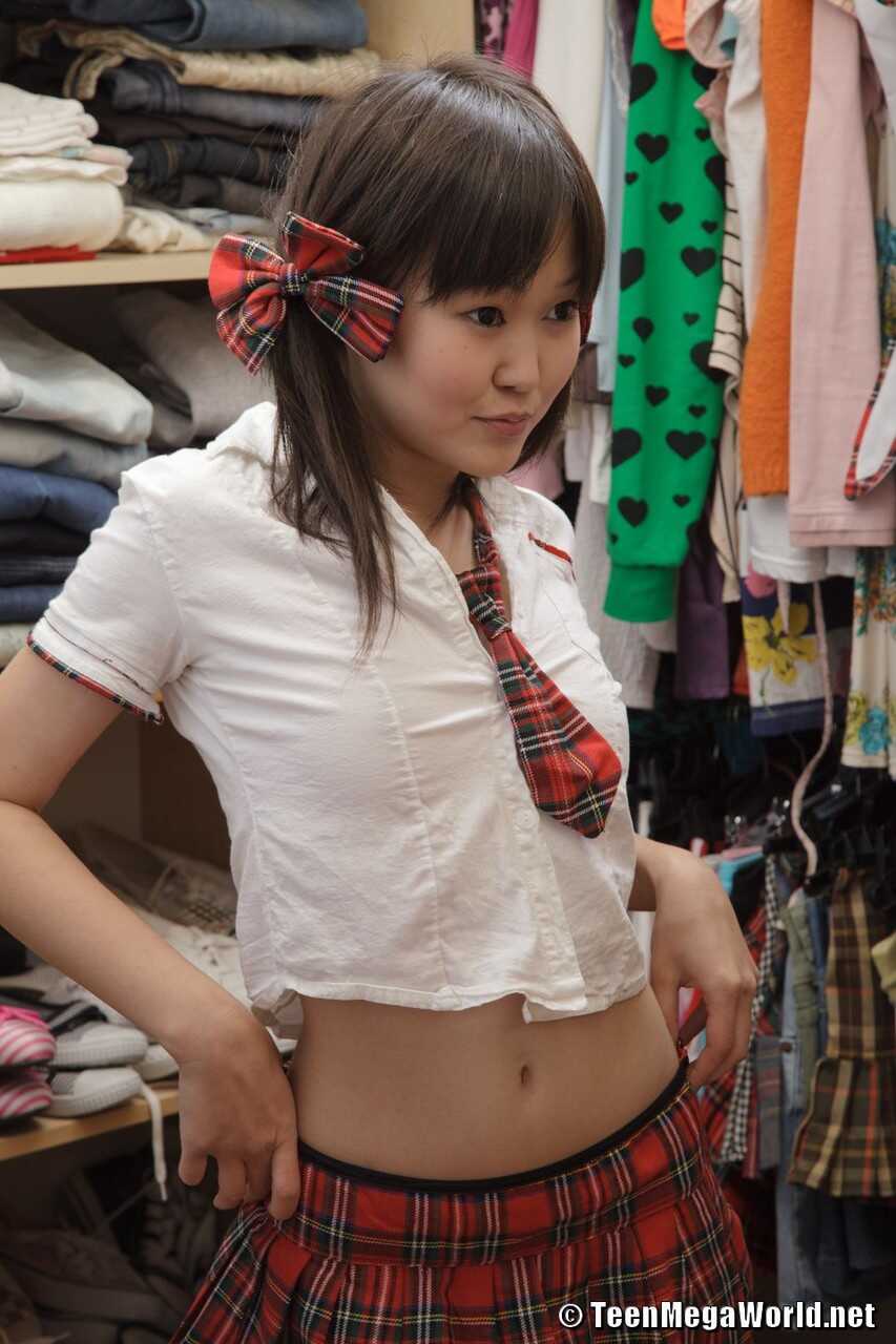 Little Asian teen Ksu puts her schoolgirl outfit on and masturbates in the shower after school - Ksu
