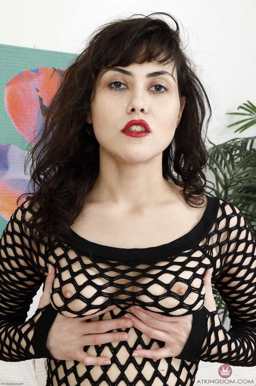 Sexy Audrey Noir plays with her trimmed pussy and small tits after stripping! - Audrey Noir