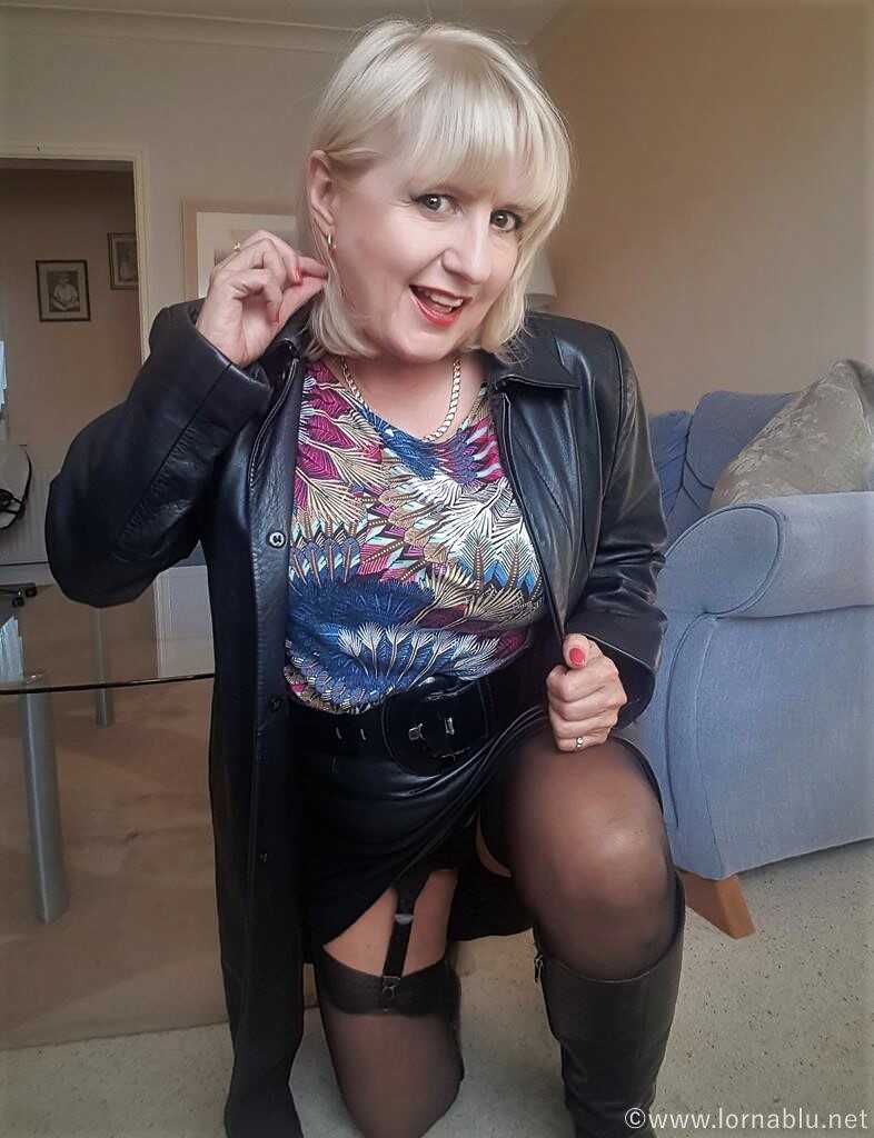 Fat mature Lorna Blu slowly strips off her garter belt to reveal her huge natural tits and big ass - Lorna Blu