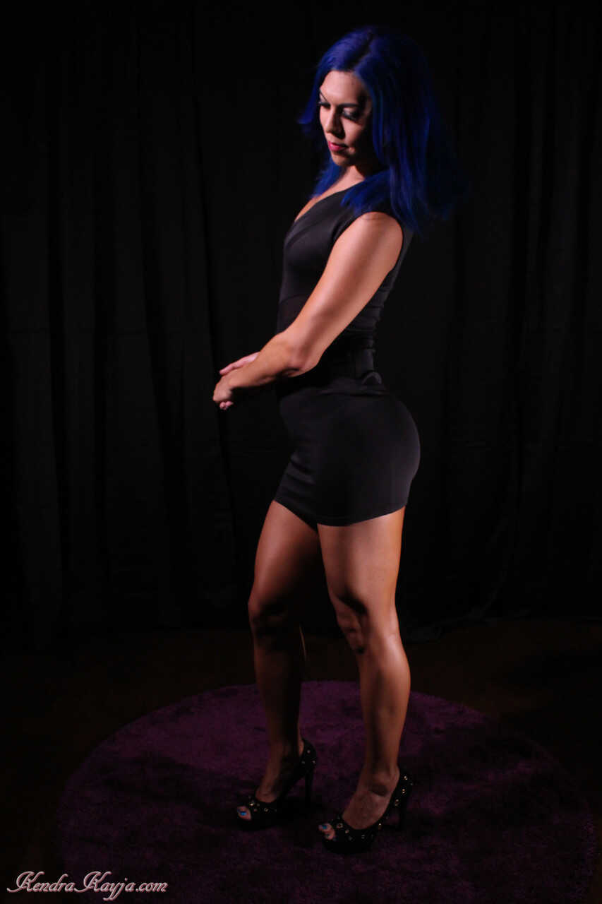 The Curvy Blue-Haired Siren Strips Down for Your Pleasure: Kendra Sinclaire's Naughty Naked Display in Black Lingerie...