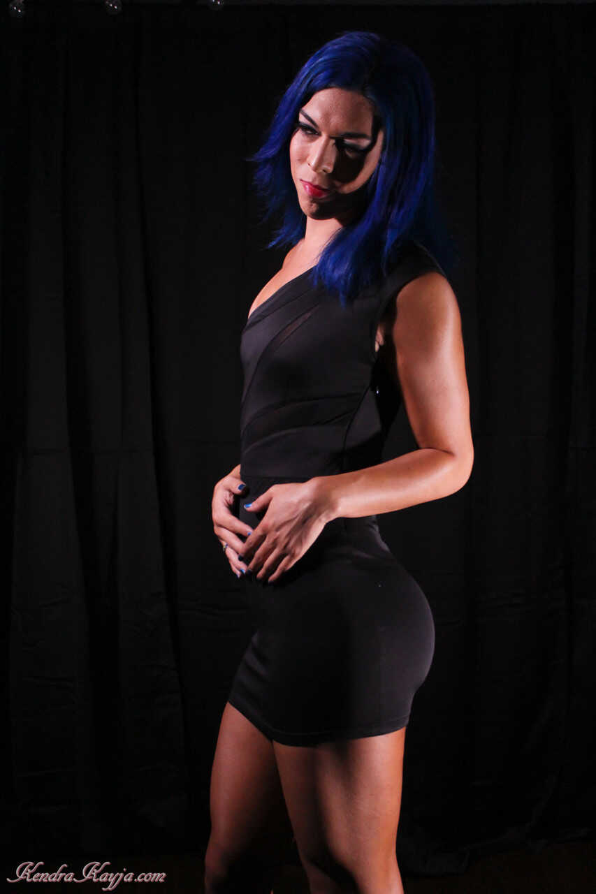 The Curvy Blue-Haired Siren Strips Down for Your Pleasure: Kendra Sinclaire's Naughty Naked Display in Black Lingerie...
