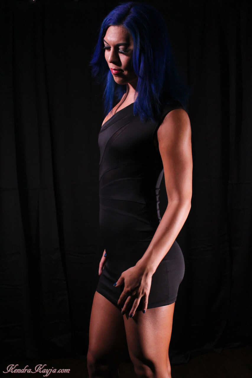 The Curvy Blue-Haired Siren Strips Down for Your Pleasure: Kendra Sinclaire's Naughty Naked Display in Black Lingerie...