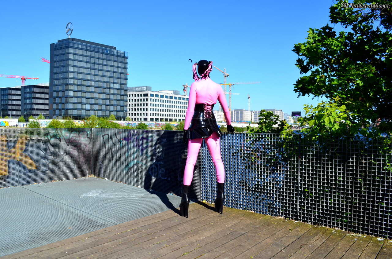 Latex Goddess: Busty RubberDoll Poses Outside In Her Skintight Suit