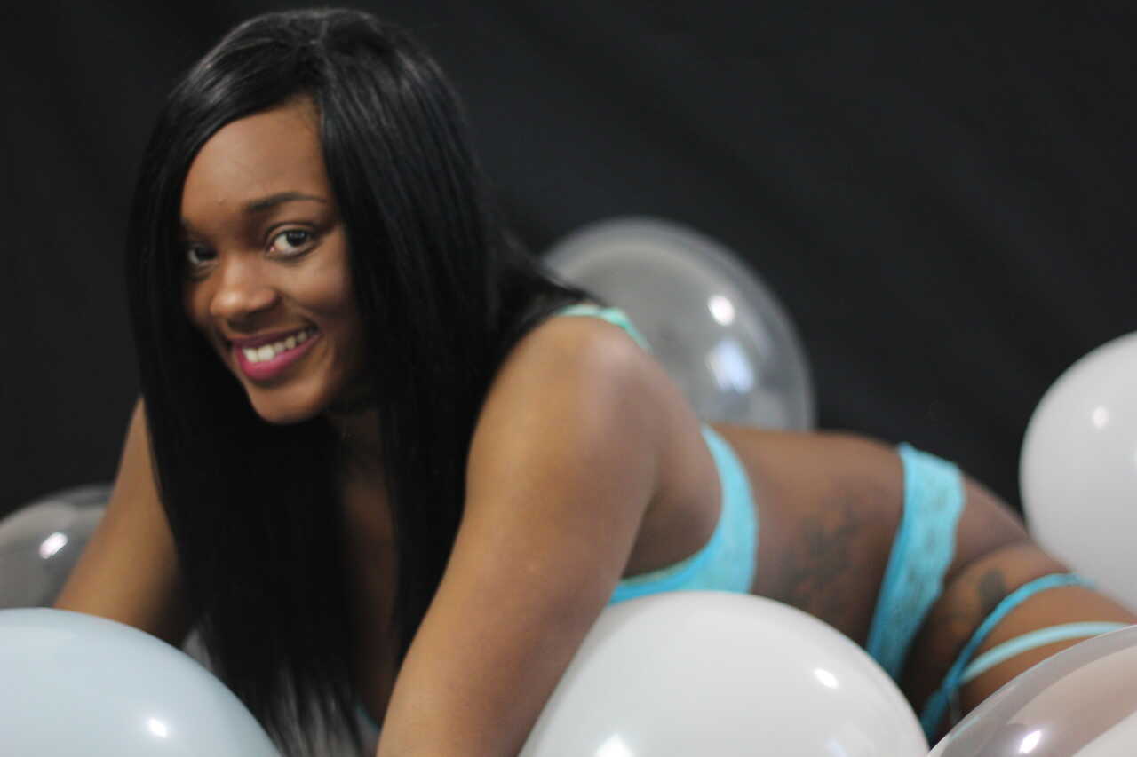 Black Kassey Starr Blowing Up Balloons With Her Cleavage - Kassey Starr