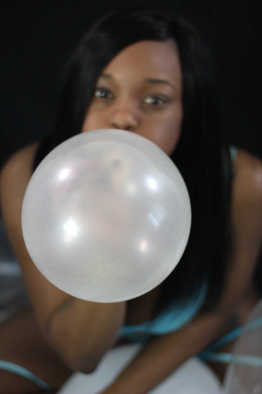 Black Kassey Starr Blowing Up Balloons With Her Cleavage - Kassey Starr
