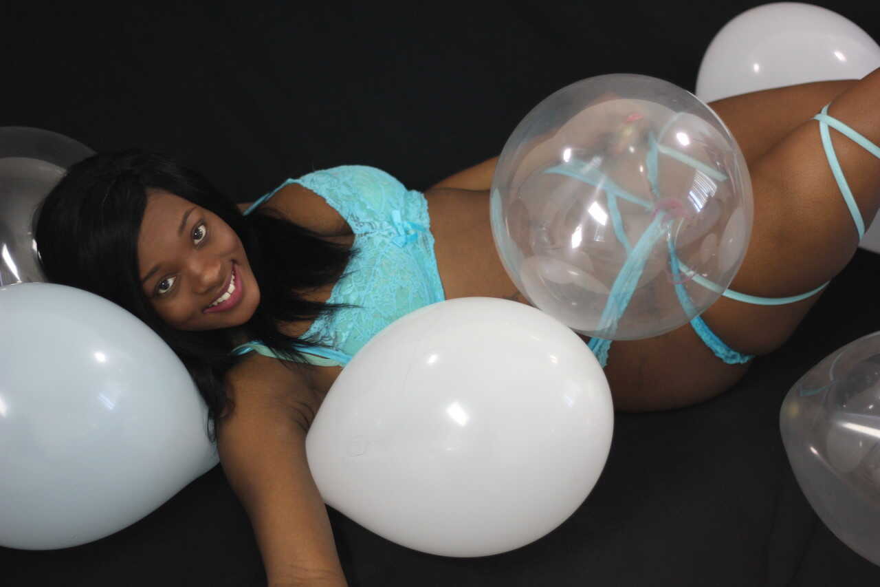 Black Kassey Starr Blowing Up Balloons With Her Cleavage - Kassey Starr