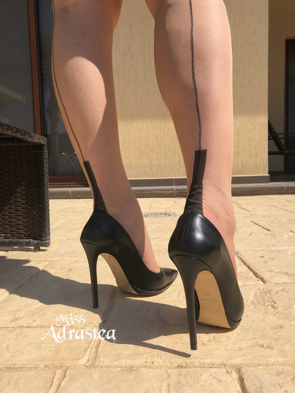 The Seductive Tease: Miss Adrastea's Stocking Feet and High Heels Display - Miss Adrastea