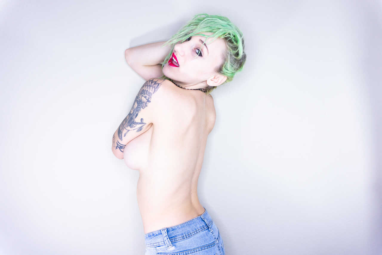 Milf Kitty Quinn's Green Hair and Ink Showing Off Her Big Tits and Tasty Ass in Jeans