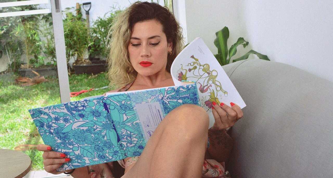 Inked MILF Andrea Garcia's Curly Blonde MILF Selfie Reveals Her Amazing Big Tits and Tan Lines While Reading on a Cou...