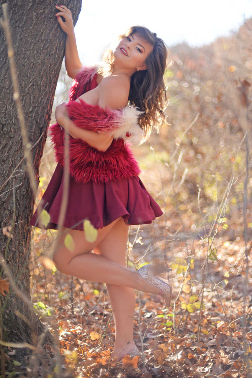 Beautiful babe Carolina Rayne poses in her elegant dress & heels in the forest