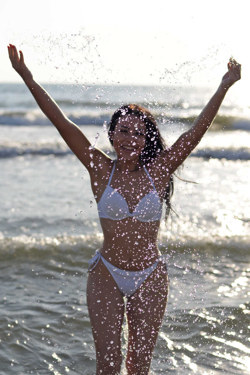 Julia Joy gets wild in the waves with her bikini at Amateur Beach