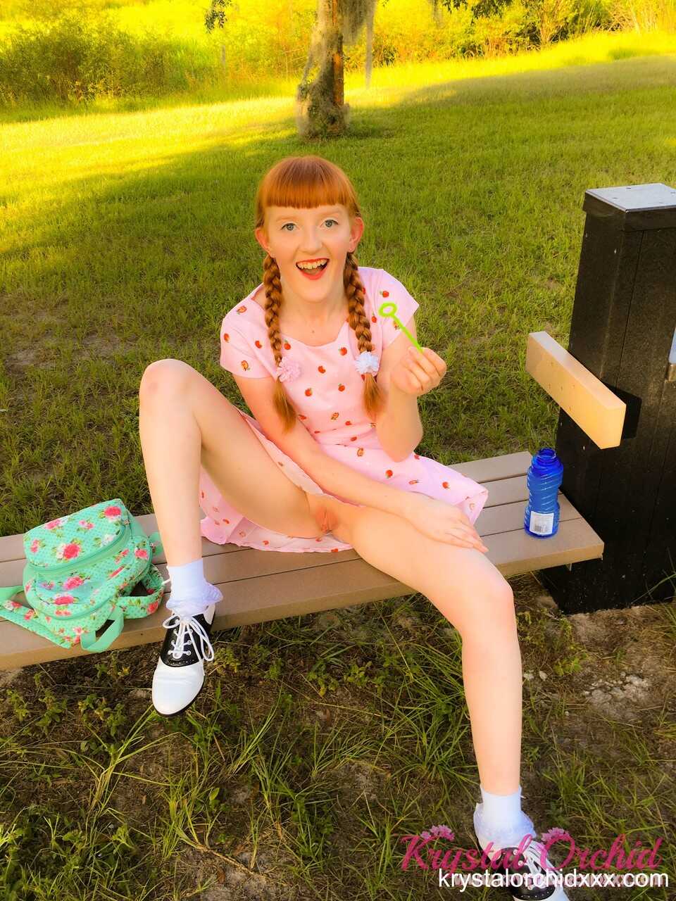 Redheaded teen Krystal Orchid outdoor ass and boobs show - Krystal Orchid
