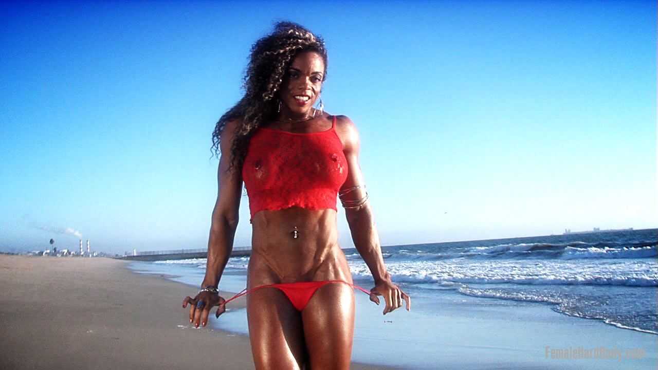 Pierced Stomach Bodybuilder Alexis Ellis Flaunts Her Ass on the Beach