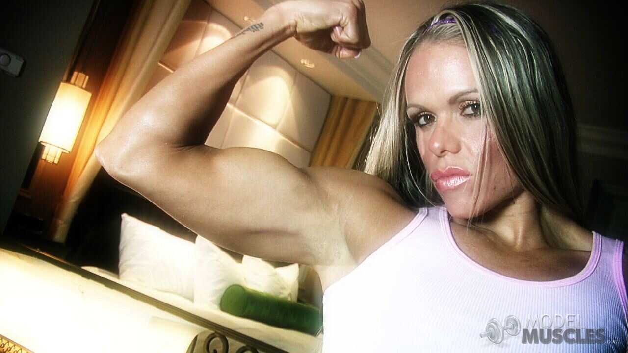Brazilian Body Builder with Big Ass Larissa Reis Flaunting Muscles in a Plaid Skirt - Larissa Reis