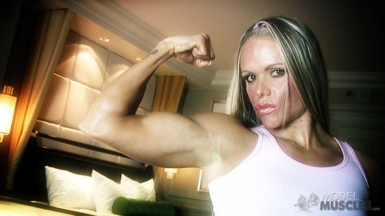 Brazilian Body Builder with Big Ass Larissa Reis Flaunting Muscles in a Plaid Skirt - Larissa Reis