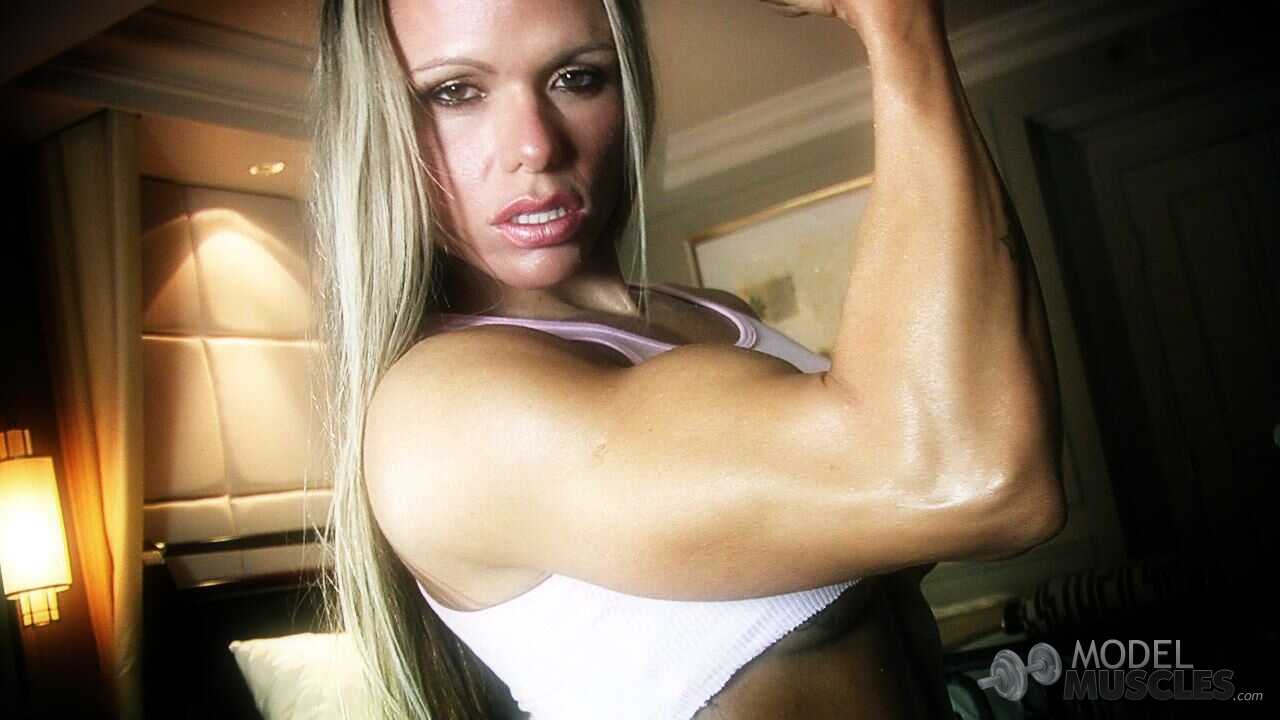 Brazilian Body Builder with Big Ass Larissa Reis Flaunting Muscles in a Plaid Skirt - Larissa Reis