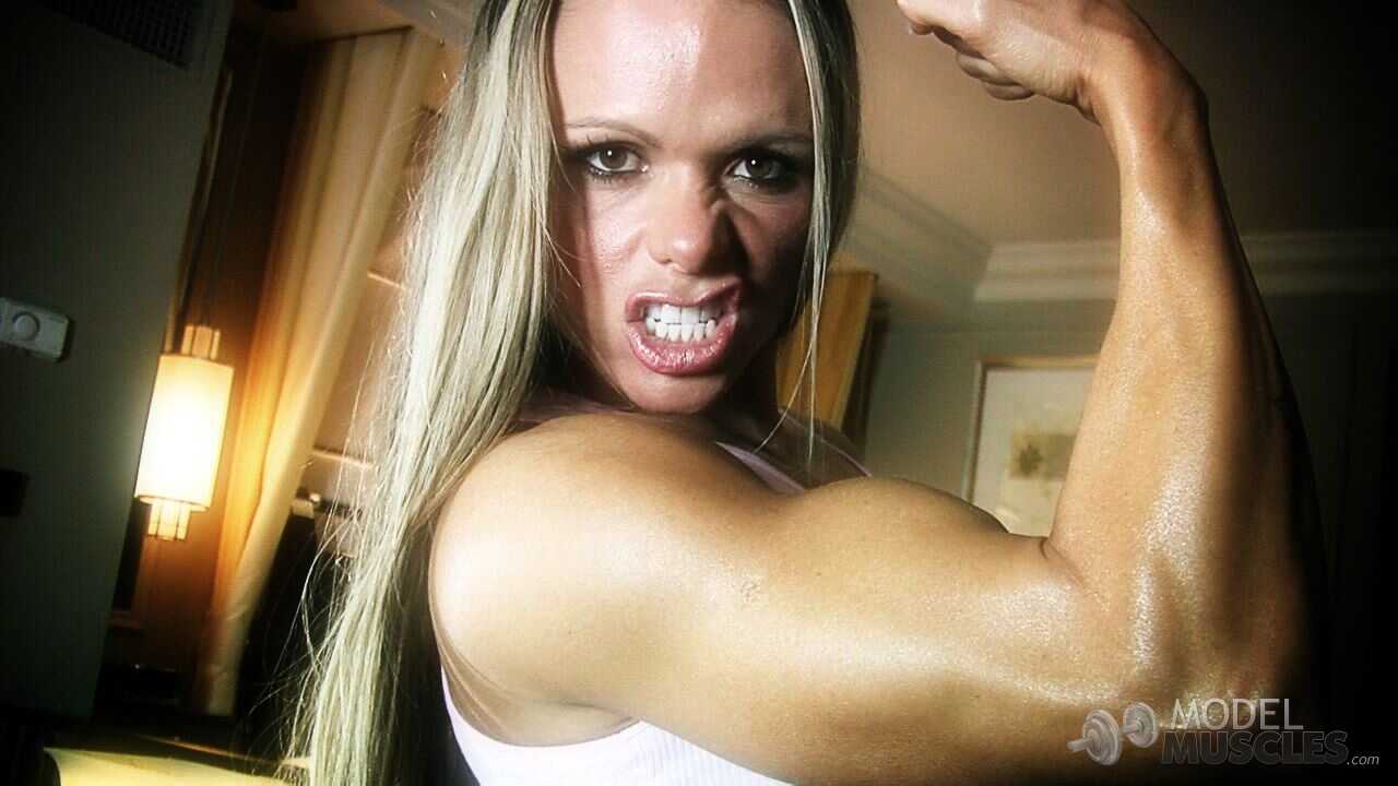 Brazilian Body Builder with Big Ass Larissa Reis Flaunting Muscles in a Plaid Skirt - Larissa Reis