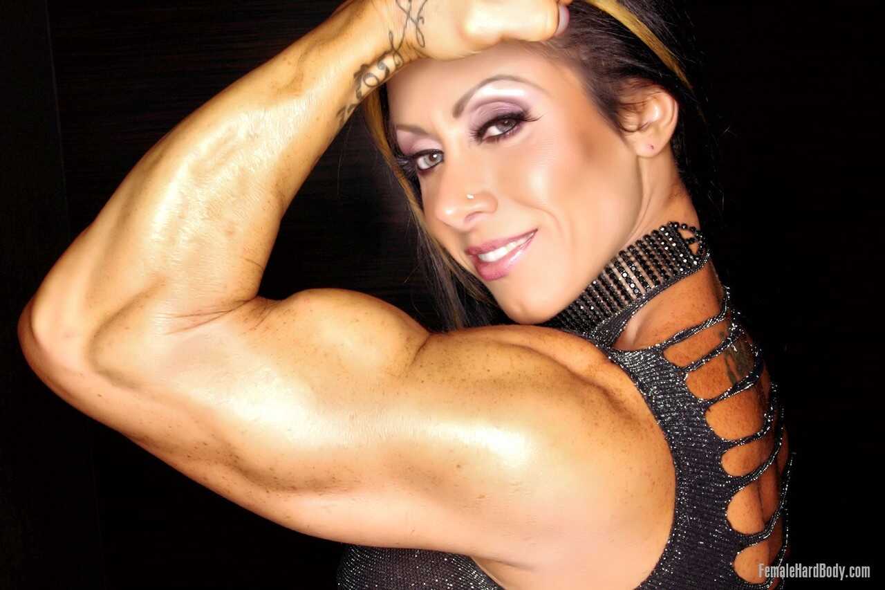 Glamorous bodybuilder Monica Martin shows off her massive muscles in a skintight dress, leaving nothing to the imagination...